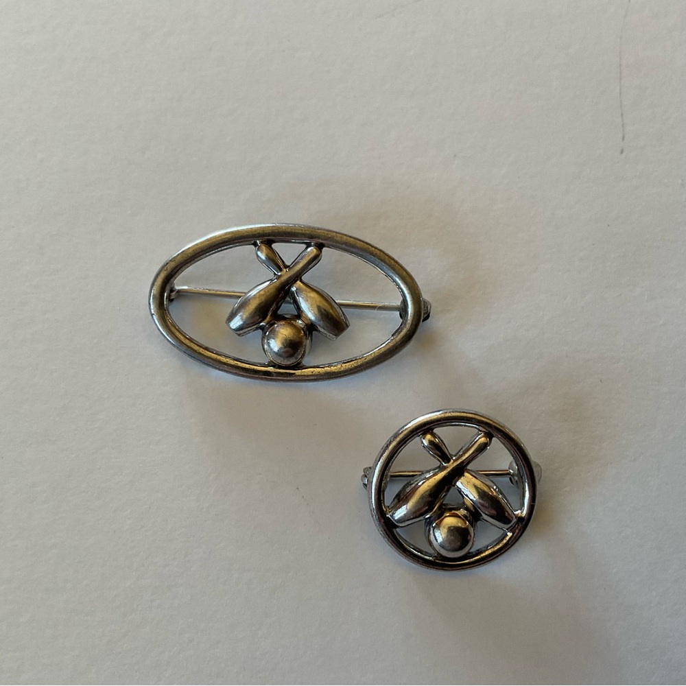 Sterling’s silver bowling pin and ball pins